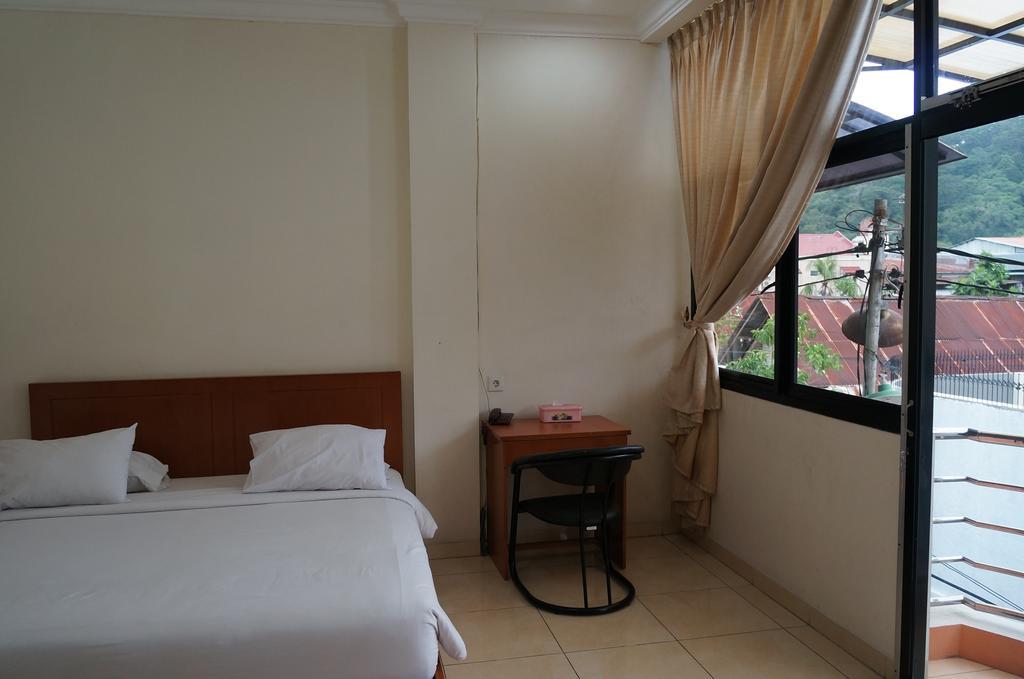Jesnic Hotel Padang  Habitación foto