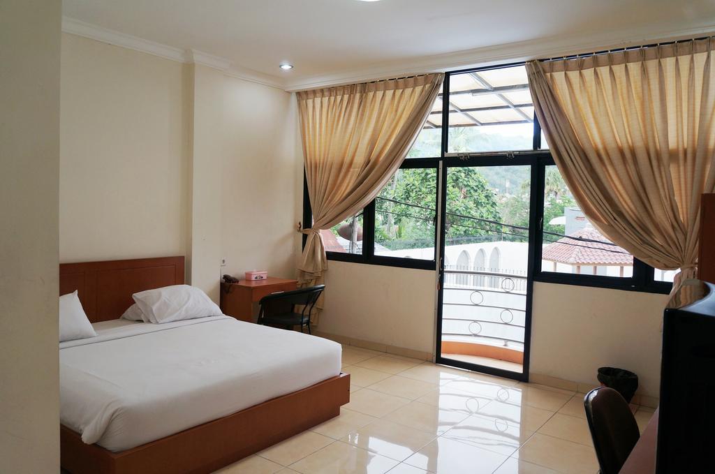 Jesnic Hotel Padang  Habitación foto