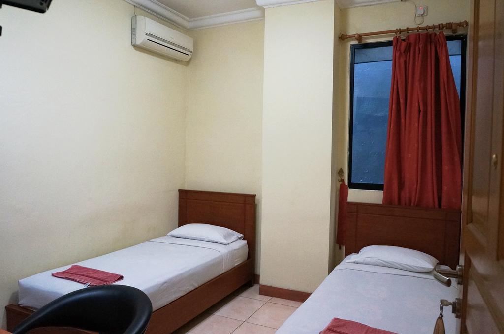 Jesnic Hotel Padang  Habitación foto